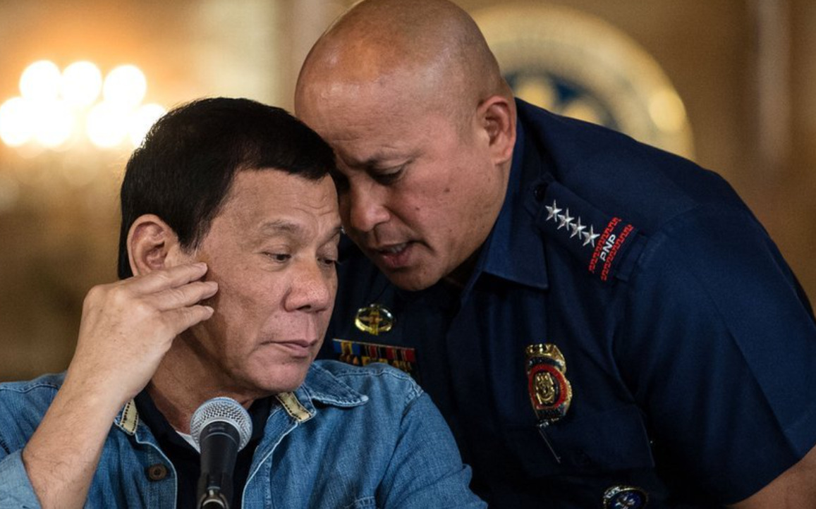 incident armat in senatul filipinez un senator cautat de curtea penala internationala cere populatiei sa previna arestarea sa